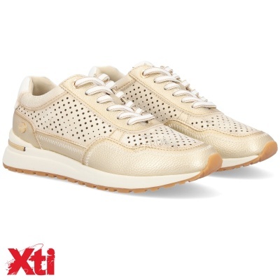 Ténis femininos dourados com padrão perfurado e sola branca