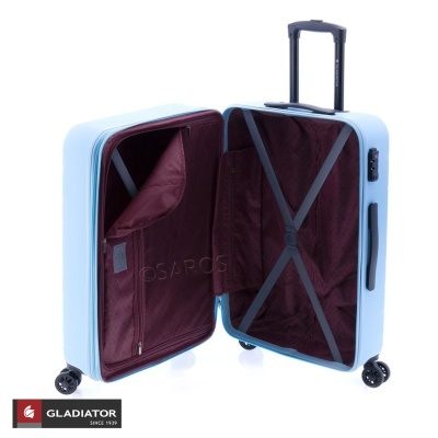 Mala de viagem rígida azul clara aberta com interior bordô