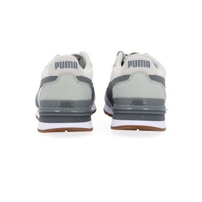 Sapatilhas PUMA cinza e branco vistas pela traseira