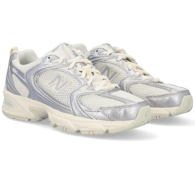 Sapatilhas desportivas New Balance cinza e branco com logo N e número 580