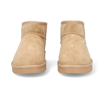 Botas slip-on em camurça bege com sola castanha clara