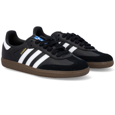 Sapatilhas Adidas Samba pretas com riscas brancas e sola castanha