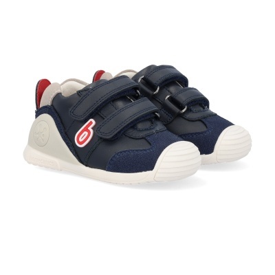 Ténis infantis azul escuro com sola branca e fecho de velcro duplo