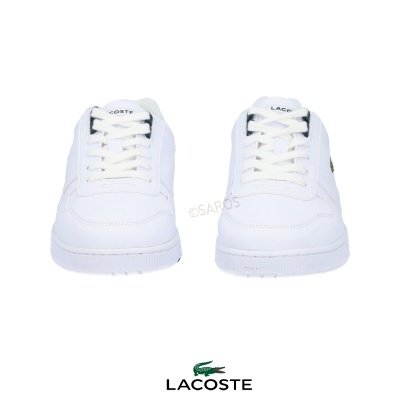 Ténis Lacoste brancos em pele com logótipo verde de crocodilo e texto LACOSTE.
