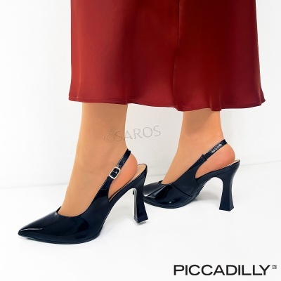 Sapatos de salto alto slingback pretos em verniz com saia vermelha