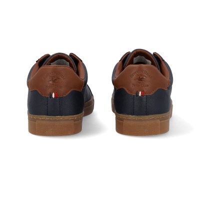 Ténis de couro azul escuro com detalhes castanhos e sola castanha vistos por trás