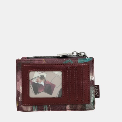 Carteira pequena bordô com padrão colorido e porta-cartões