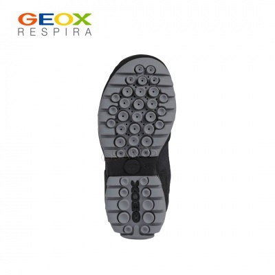 Sola de sapato cinzenta Geox com padrão redondo detalhado sobre fundo branco