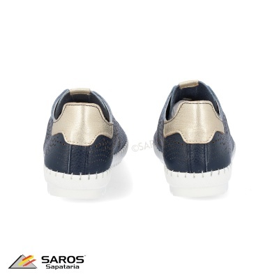 Sapatos baixos azul escuro e dourado metálico, sola branca, vistos de trás