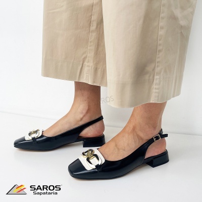 Sapatos femininos slingback pretos com detalhe branco e fivela dourada