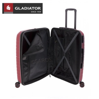 Mala de viagem rígida vermelha com interior preto aberta
