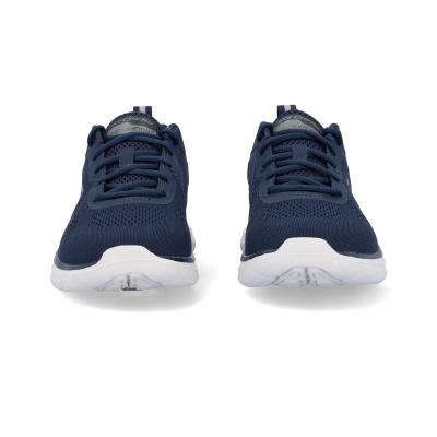 Sapatilhas desportivas azuis com sola branca vistas de frente