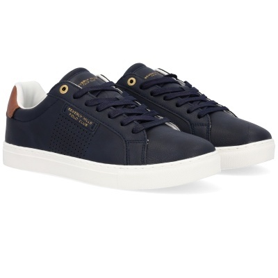 ténis azul escuro com sola branca e detalhes em castanho