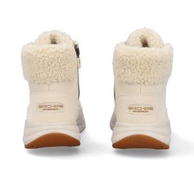 Botas Skechers impermeáveis bege claro com pelo sintético vista traseira.