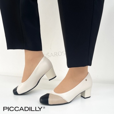 Sapatos femininos em azul escuro, bege e branco com salto médio e bico redondo.