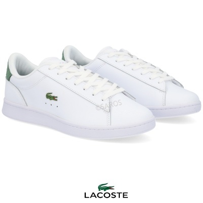 Sapatilhas brancas Lacoste com detalhes verdes e logo de crocodilo