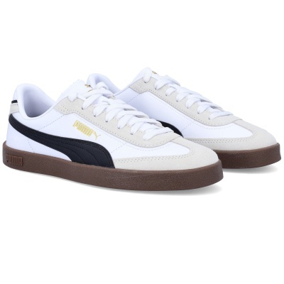 Sapatilhas Puma brancas e bege com risca preta e sola castanha clara