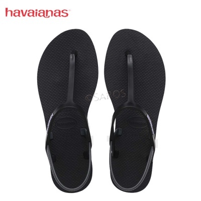 Chinelos Havaianas pretos de borracha com tiras finas e logo
