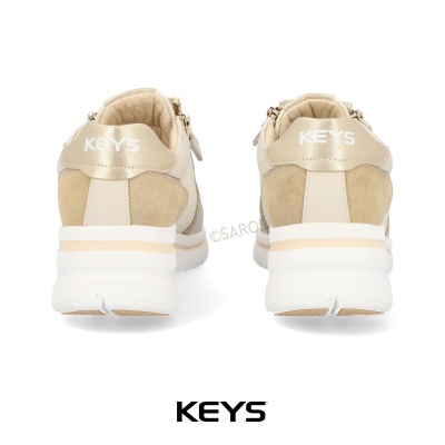Ténis desportivos bege claro com sola branca e logótipo KEYS na parte traseira