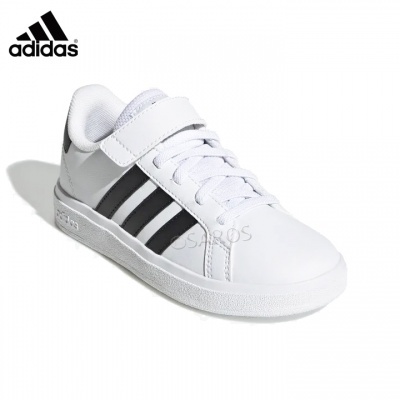 Ténis brancos Adidas com riscas pretas e fecho em velcro
