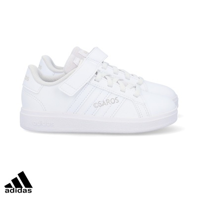 Sapatilhas brancas Adidas com atacadores e tira de velcro