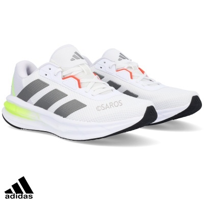 Sapatilhas desportivas Adidas brancas com riscas cinzentas e detalhe amarelo fluorescente