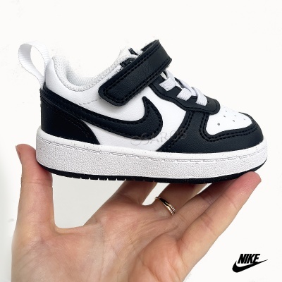 Ténis infantil Nike branco e preto com fecho de velcro