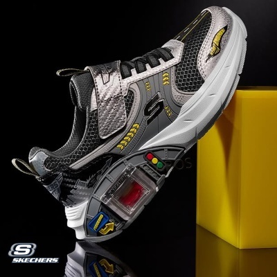 Ténis Skechers com detalhes amarelos, preto, cinzento e sola branca com elementos coloridos