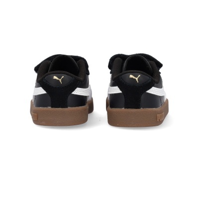 Sapatilhas Puma pretas e brancas com sola castanha vistas de trás