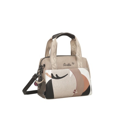 Mala de mão bege com desenho abstrato e alças de tecido