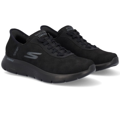 Ténis pretos Skechers com sola robusta e logótipo 'S' cinzento