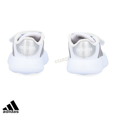 Sapatilhas Adidas brancas com detalhes prateados vistas de trás
