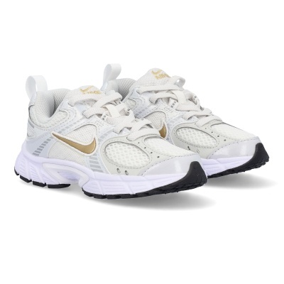 Sapatilhas desportivas Nike branco e dourado com sola branca e preta