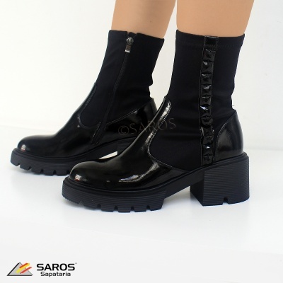 Botas pretas femininas de cano médio com salto grosso e detalhes em tecido elástico