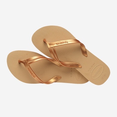 Chinelos Havaianas bege com tiras metálicas bronze