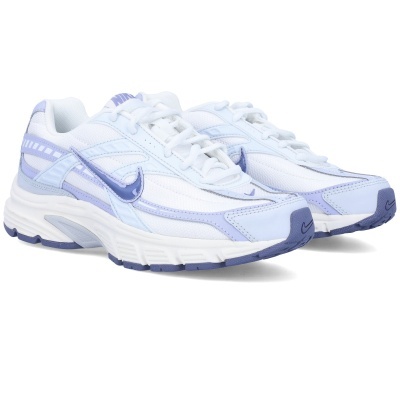 Sapatilhas desportivas Nike brancas e lilás com logótipo e sola branca