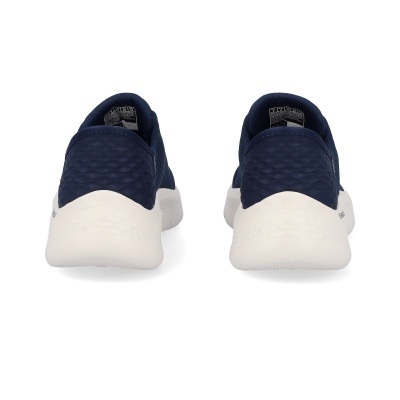 Sapatilhas desportivas azuis vistas de trás com sola branca.