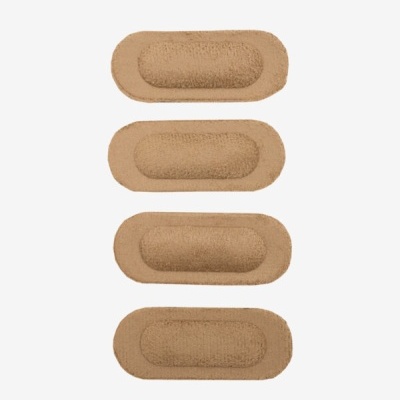 Quatro pensos rápidos castanhos com textura adesiva