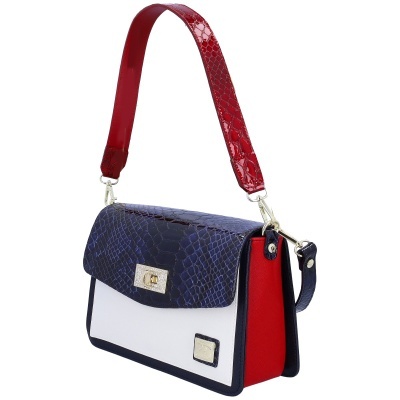 Mala de ombro azul escuro com branco e vermelho, padrão de pele de cobra e fecho dourado.