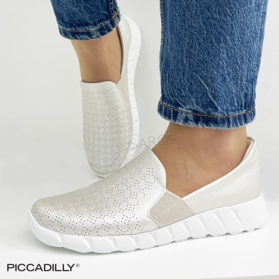 Sapatos femininos bege claro perfurados com sola branca e detalhes elásticos laterais