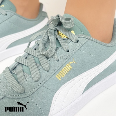 Ténis Puma verde-água com risca branca e logótipo dourado
