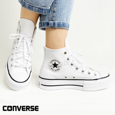 Ténis Converse All Star brancos em tela com sola espessa e logótipo lateral