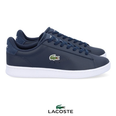 Tênis azul escuro Lacoste com sola branca e logo crocodilo verde