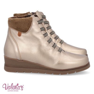 Bota de montanha feminina prateada com sola castanha e interior forrado a pelo castanho.