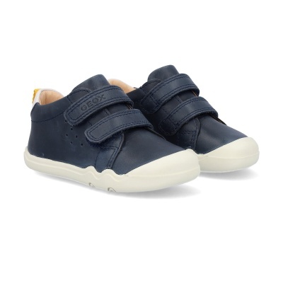 Sapatilhas Geox azuis escuras em pele com sola branca e fecho em velcro.