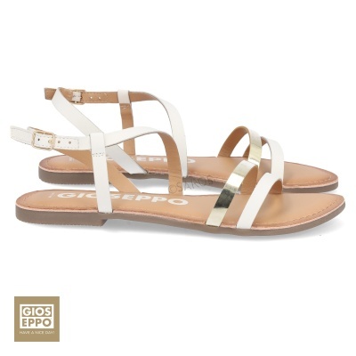 Sandálias planas brancas e douradas Gioseppo com fecho de fivela.
