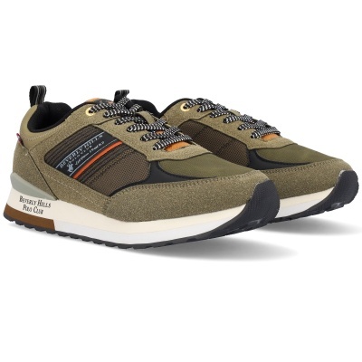 Ténis de corrida verde e castanho com detalhes e sola branca.