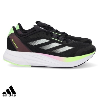 Sapatilhas Adidas pretas com riscas brancas e detalhes verdes e cor-de-rosa no solado