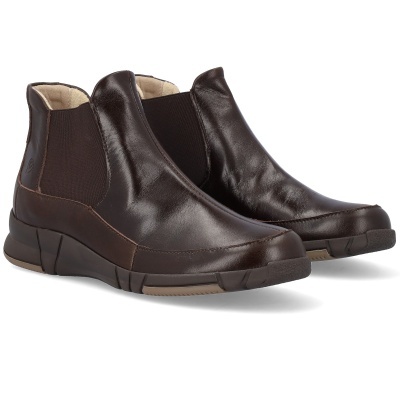 Botas Chelsea masculinas castanhas em pele com laterais elásticas e sola preta e bege.