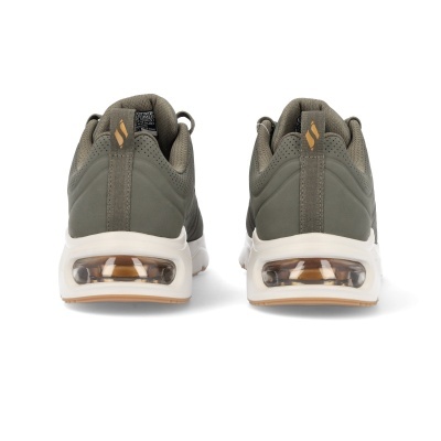 Ténis desportivos verdes com sola branca e amortecimento visível